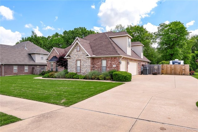 traditional home with concrete driveway, stone siding, brick siding, board and batten siding, and a gate