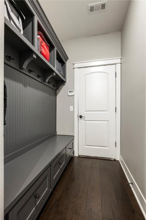 914 King Arthur Dr, Elm Springs, AR 72762 - mudroom with dark wood-style floors and baseboards