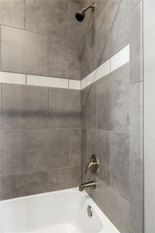 914 King Arthur Dr, Elm Springs, AR 72762 - bathroom view of shower / tub combination