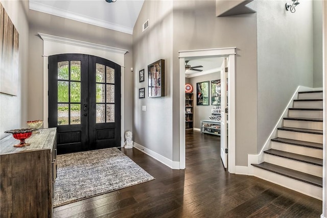 914 King Arthur Dr, Elm Springs, AR 72762 - foyer entrance featuring french doors, crown molding, wood finished floors, stairway, and baseboards