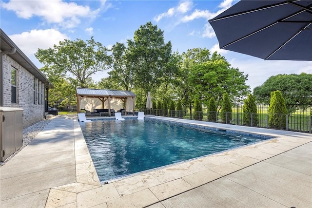 914 King Arthur Dr, Elm Springs, AR 72762 - view of pool featuring fence, a gazebo, a patio area, and outdoor lounge area