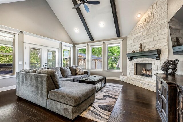 914 King Arthur Dr, Elm Springs, AR 72762 - living room with a fireplace, baseboards, high vaulted ceiling, a ceiling fan, and dark wood-type flooring