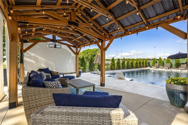 914 King Arthur Dr, Elm Springs, AR 72762 - view of patio / terrace with an outdoor hangout area, a gazebo, and fence