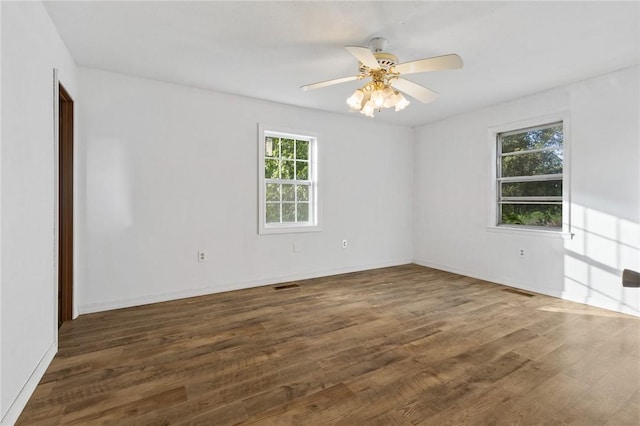 170 NC-8376, Jasper, AR 72641 - empty room featuring wood finished floors, ceiling fan, and baseboards