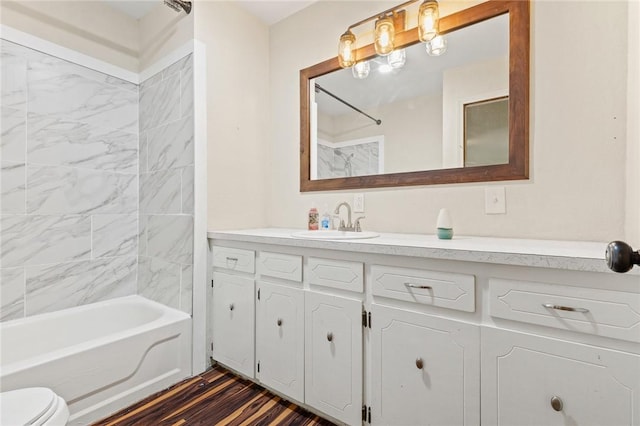 170 NC-8376, Jasper, AR 72641 - bathroom featuring shower / tub combination, toilet, vanity, and wood finished floors