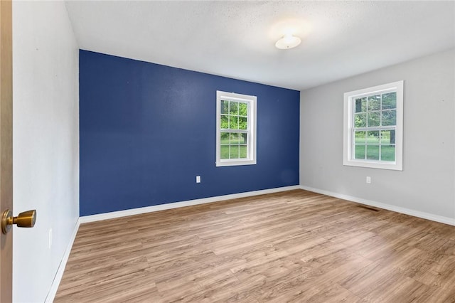 170 NC-8376, Jasper, AR 72641 - empty room with wood finished floors and baseboards