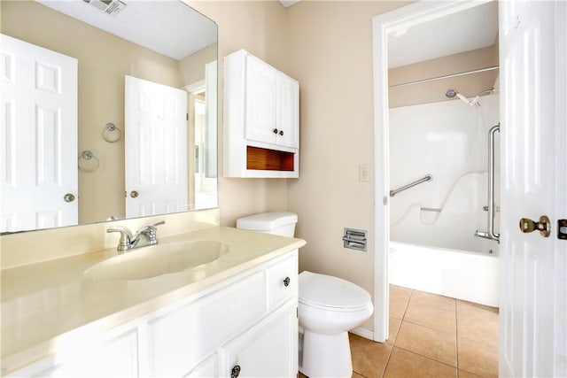 full bathroom with toilet, vanity, tile patterned flooring, and shower / washtub combination