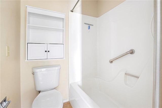 bathroom featuring toilet and tile patterned floors