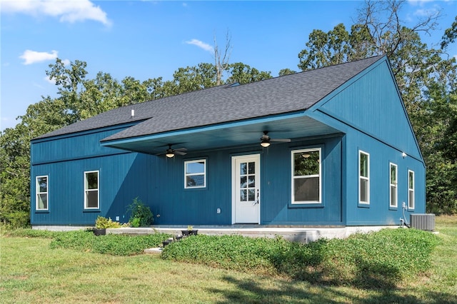 9783 Ar-59, Decatur, AR 72722 - back of property featuring ceiling fan, a shingled roof, a lawn, and central AC unit