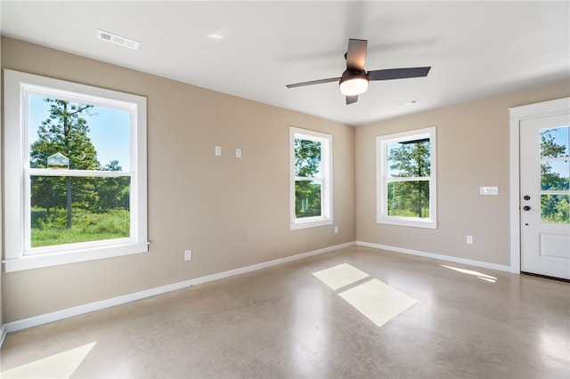 9783 Ar-59, Decatur, AR 72722 - empty room with finished concrete flooring, healthy amount of natural light, and baseboards