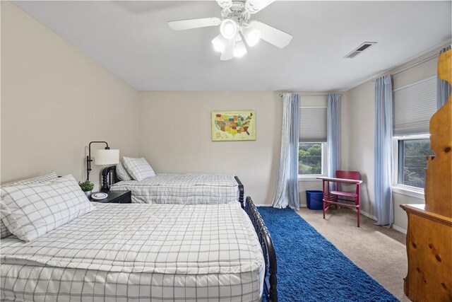 14156 Rolling Hills Dr, Bentonville, AR 72712 - carpeted bedroom with baseboards and ceiling fan