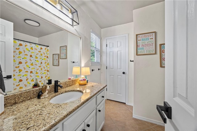 14156 Rolling Hills Dr, Bentonville, AR 72712 - bathroom featuring tile patterned flooring, vanity, and baseboards