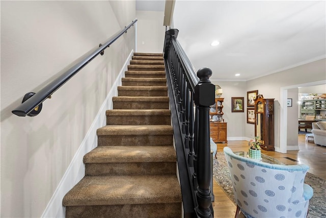 14156 Rolling Hills Dr, Bentonville, AR 72712 - stairs with wood finished floors, recessed lighting, ornamental molding, and baseboards