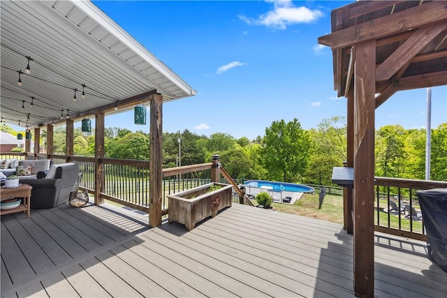 14156 Rolling Hills Dr, Bentonville, AR 72712 - deck featuring an outdoor pool, an outdoor hangout area, and view of scattered trees