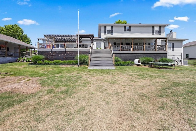 14156 Rolling Hills Dr, Bentonville, AR 72712 - back of property with a lawn, stairs, and a chimney