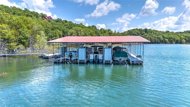 20916 Slate Gap Rd, Garfield, AR 72732 - dock area with boat lift, a forest view, and a water view