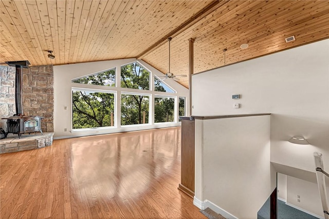 20916 Slate Gap Rd, Garfield, AR 72732 - interior space with a wood stove and healthy amount of natural light