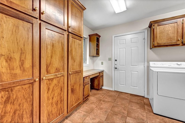 20916 Slate Gap Rd, Garfield, AR 72732 - washroom with washer / dryer, cabinet space, a desk, and light tile patterned floors