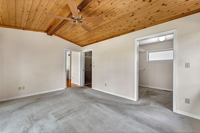 20916 Slate Gap Rd, Garfield, AR 72732 - unfurnished bedroom with carpet, wood ceiling, a spacious closet, baseboards, and ceiling fan