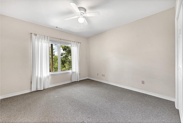 20916 Slate Gap Rd, Garfield, AR 72732 - carpeted empty room with baseboards and ceiling fan