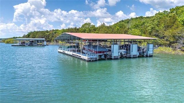 20916 Slate Gap Rd, Garfield, AR 72732 - dock featuring a water view, boat lift, and a wooded view