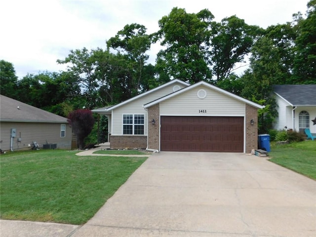 1411 Cresent St, Bentonville, AR 72712 - ranch-style home featuring brick siding, a front yard, a garage, and concrete driveway