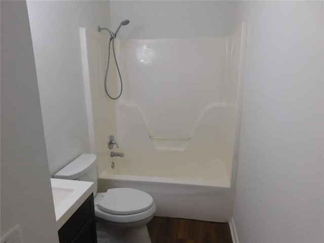 1411 Cresent St, Bentonville, AR 72712 - bathroom with vanity, toilet, wood finished floors, and shower / tub combination