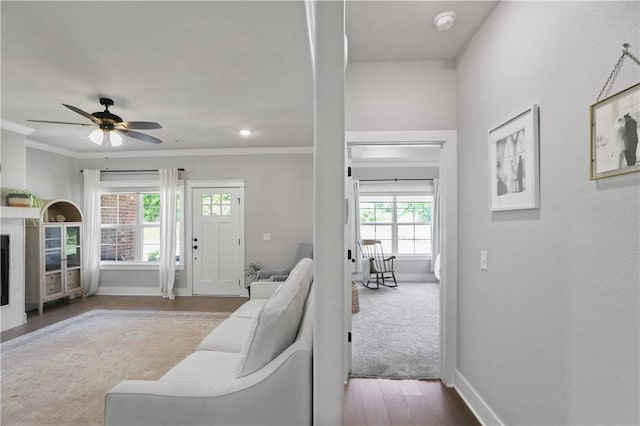3 Francis Dr, Bella Vista, AR 72715 - living room with baseboards, a ceiling fan, wood finished floors, and crown molding