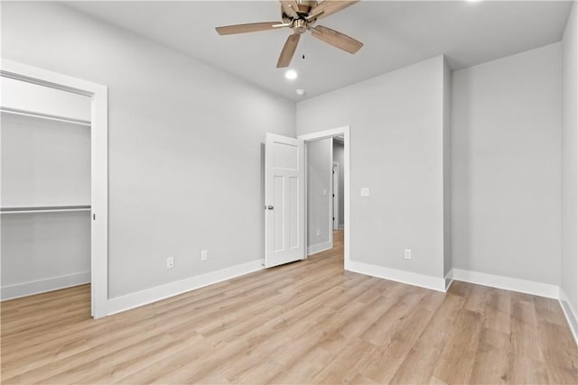 unfurnished bedroom with light wood finished floors, baseboards, a closet, a ceiling fan, and recessed lighting