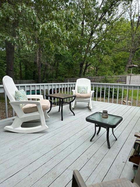 deck with outdoor dining space
