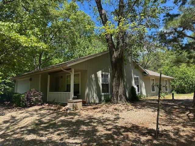view of home's exterior with covered porch