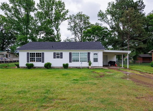 1014 Alma Ave, Mulberry, AR 72947 - ranch-style house featuring an attached carport and a shingled roof