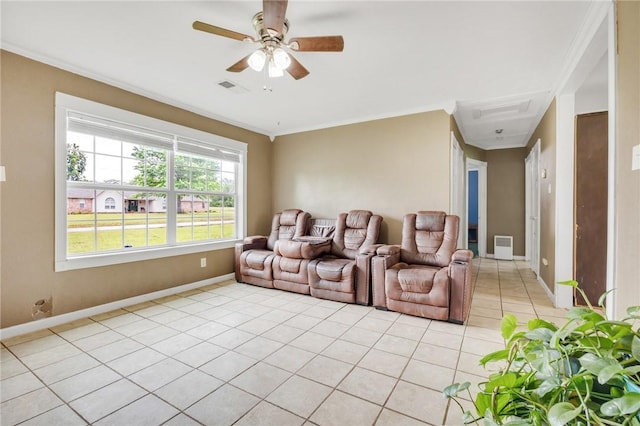 1014 Alma Ave, Mulberry, AR 72947 - living room featuring light tile patterned floors, baseboards, crown molding, and ceiling fan
