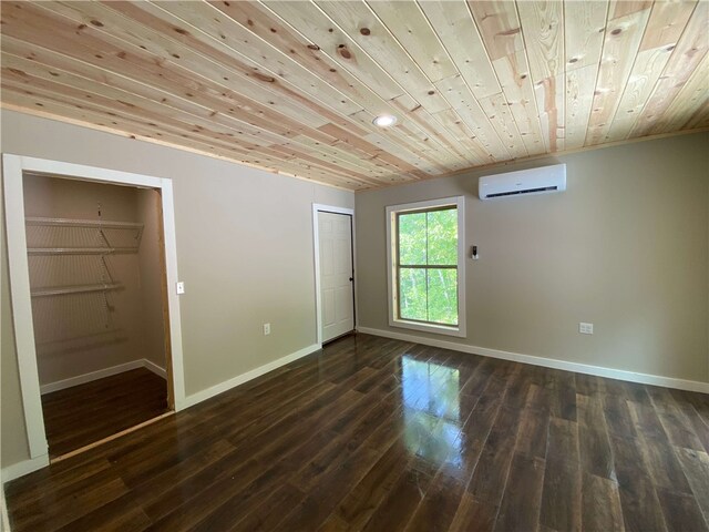 unfurnished bedroom with a wall mounted AC, wooden ceiling, dark wood-style flooring, baseboards, and recessed lighting