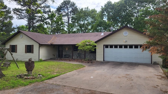 ranch-style house featuring a front lawn, an attached garage, concrete driveway, roof with shingles, and stone siding