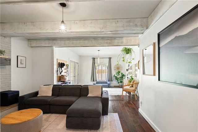 living room featuring dark wood-style floors and baseboards