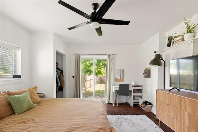 bedroom with access to outside and ceiling fan