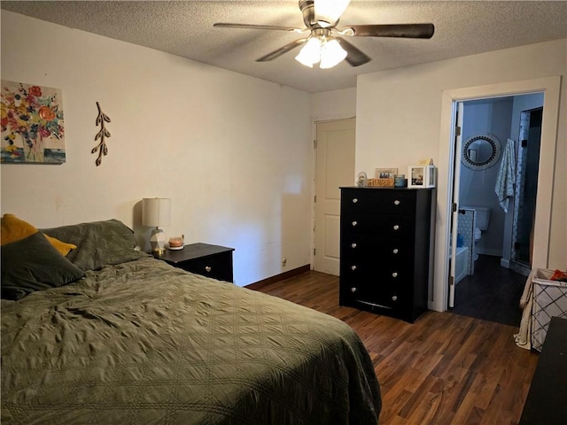 2711 Aspen Ln, Rogers, AR 72758 - bedroom featuring dark wood-style flooring, a textured ceiling, and a ceiling fan
