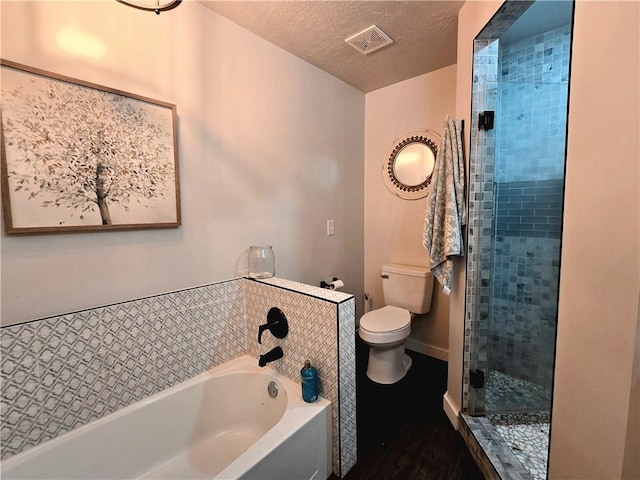2711 Aspen Ln, Rogers, AR 72758 - bathroom with a bath, a stall shower, and wood finished floors
