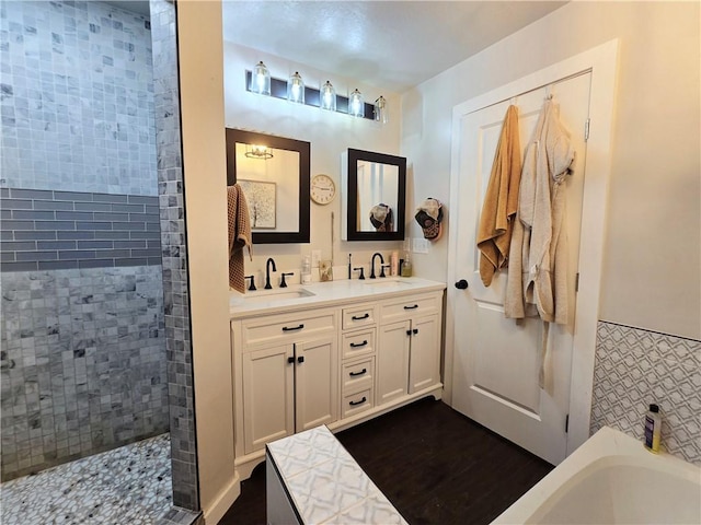 2711 Aspen Ln, Rogers, AR 72758 - full bathroom featuring a garden tub, double vanity, and tiled shower