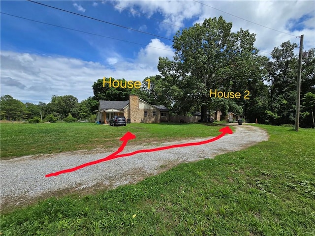 2711 Aspen Ln, Rogers, AR 72758 - surrounding community featuring a lawn
