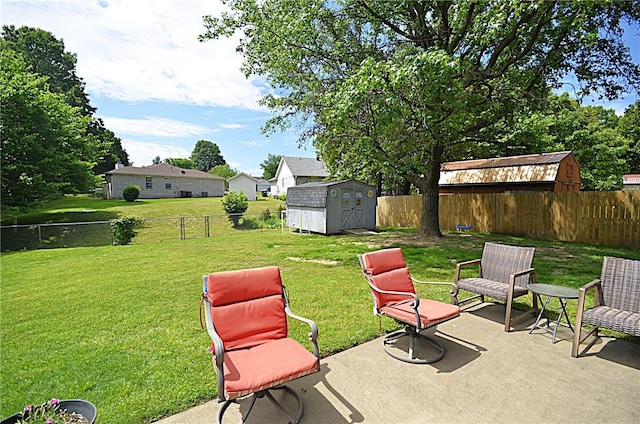 3001 Mcdonald Ave, Springdale, AR 72762 - view of yard featuring a storage shed, a patio area, and an outbuilding