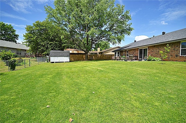 3001 Mcdonald Ave, Springdale, AR 72762 - view of yard featuring a shed and an outdoor structure