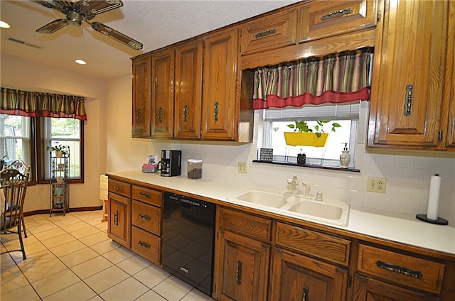 3001 Mcdonald Ave, Springdale, AR 72762 - kitchen with dishwasher, a sink, brown cabinets, backsplash, and recessed lighting