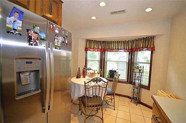 3001 Mcdonald Ave, Springdale, AR 72762 - dining space featuring light tile patterned floors, recessed lighting, and baseboards