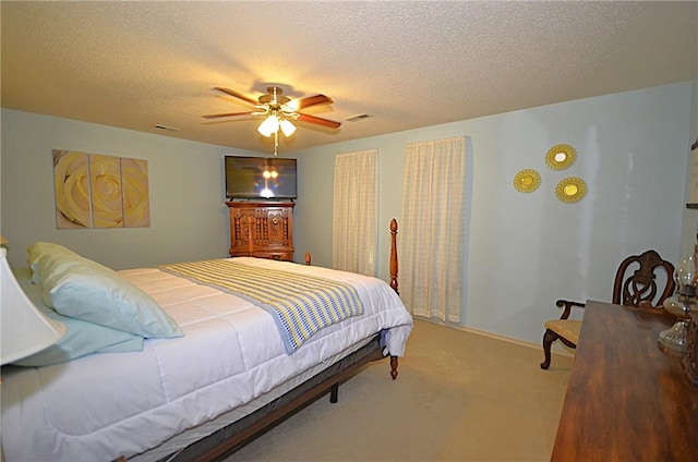 3001 Mcdonald Ave, Springdale, AR 72762 - carpeted bedroom featuring a textured ceiling and ceiling fan