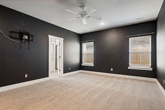 4400 SW Pawhuska St, Bentonville, AR 72713 - carpeted empty room with baseboards and ceiling fan