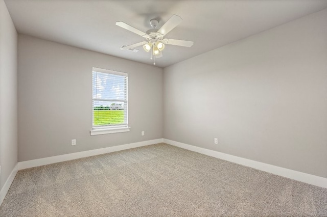 4400 SW Pawhuska St, Bentonville, AR 72713 - unfurnished room featuring carpet flooring, baseboards, and ceiling fan