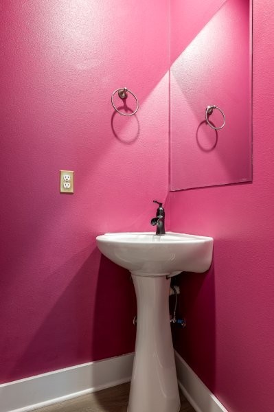 4400 SW Pawhuska St, Bentonville, AR 72713 - bathroom featuring baseboards