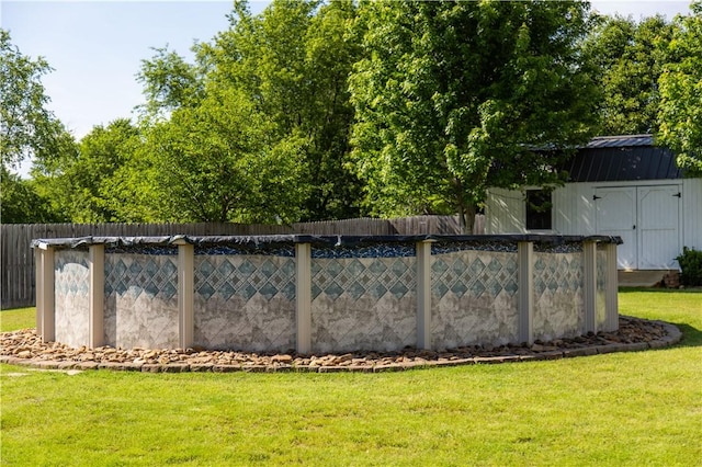 view of yard with a storage unit and an outdoor structure